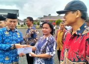 ASN Pemkab Simalungun Laksanakan Upacara HKN, 28 Anggota KORPRI Purna Tugas Mendapat Tali Asih 