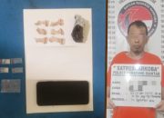 Diamankan Polisi, Mulut Residivis ini Mengeluarkan Bungkusan Plastik Hitam