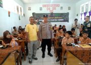 Polsek Siantar Barat Dampingi Pembagian Makanan Bergizi Gratis di SMP Swasta Kartika 