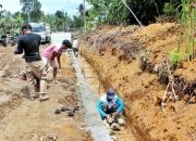Satgas TMMD ke-127 Kodim 0207/Simalungun dan Warga Bahapal Kebut Pengerjaan Drainase