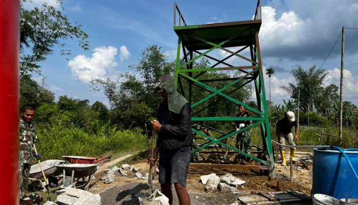Satgas TMMD Gerak Cepat Pasang Pipa Tandon Sumur Bor, Air Bersih Segera Dinikmati Warga Nagori Limag