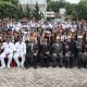 Peringati Hardiknas 2026 di Siantar, Guru SMPN 1 Kenakan Pakaian Adat Simalungun